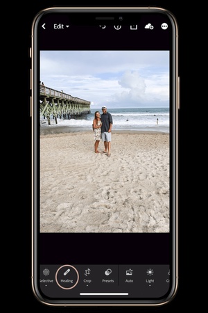 enlever les taches dans lightroom mobile app