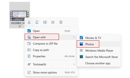 按一下「開啟方式」>「照片」
